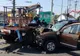 Autoturism făcut praf după ce s-a ciocnit de o macara