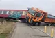 Camion lovit de tren, oameni răniți
