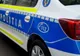 Polițiști alertați de un taximetrist în mașina căruia doi bărbați se jucau cu o armă