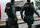 Opt percheziţii în judeţele Suceava şi Timiş, într-un dosar de contrabandă cu ţigări